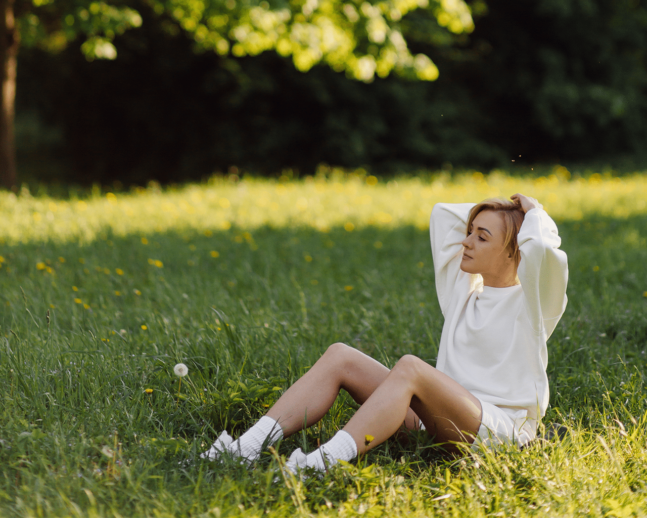 CellDerma Woman Sitting in Shade Content Image