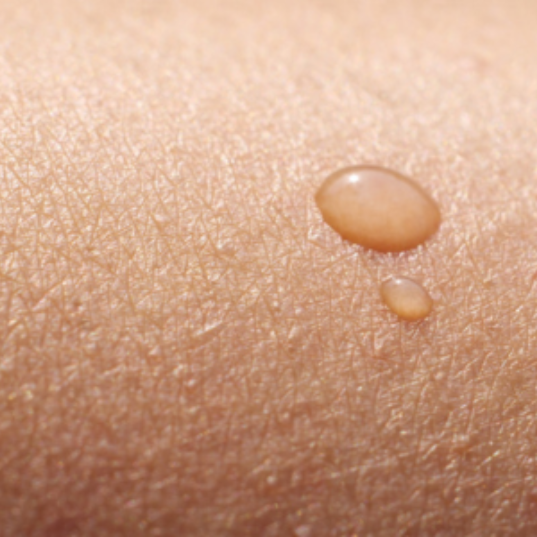 CellDerma Product Droplet Close Up Skin Content Image