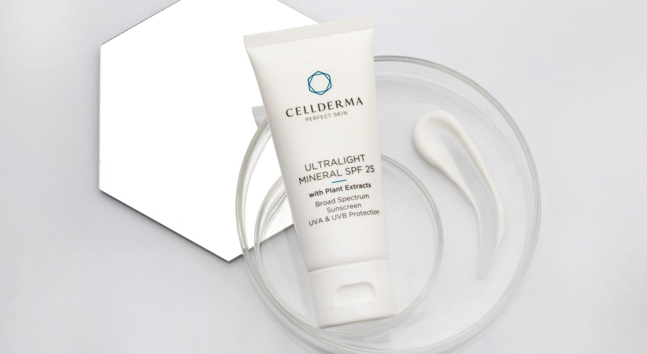 Ultralight Mineral SPF laying on mirror with slide professional photography