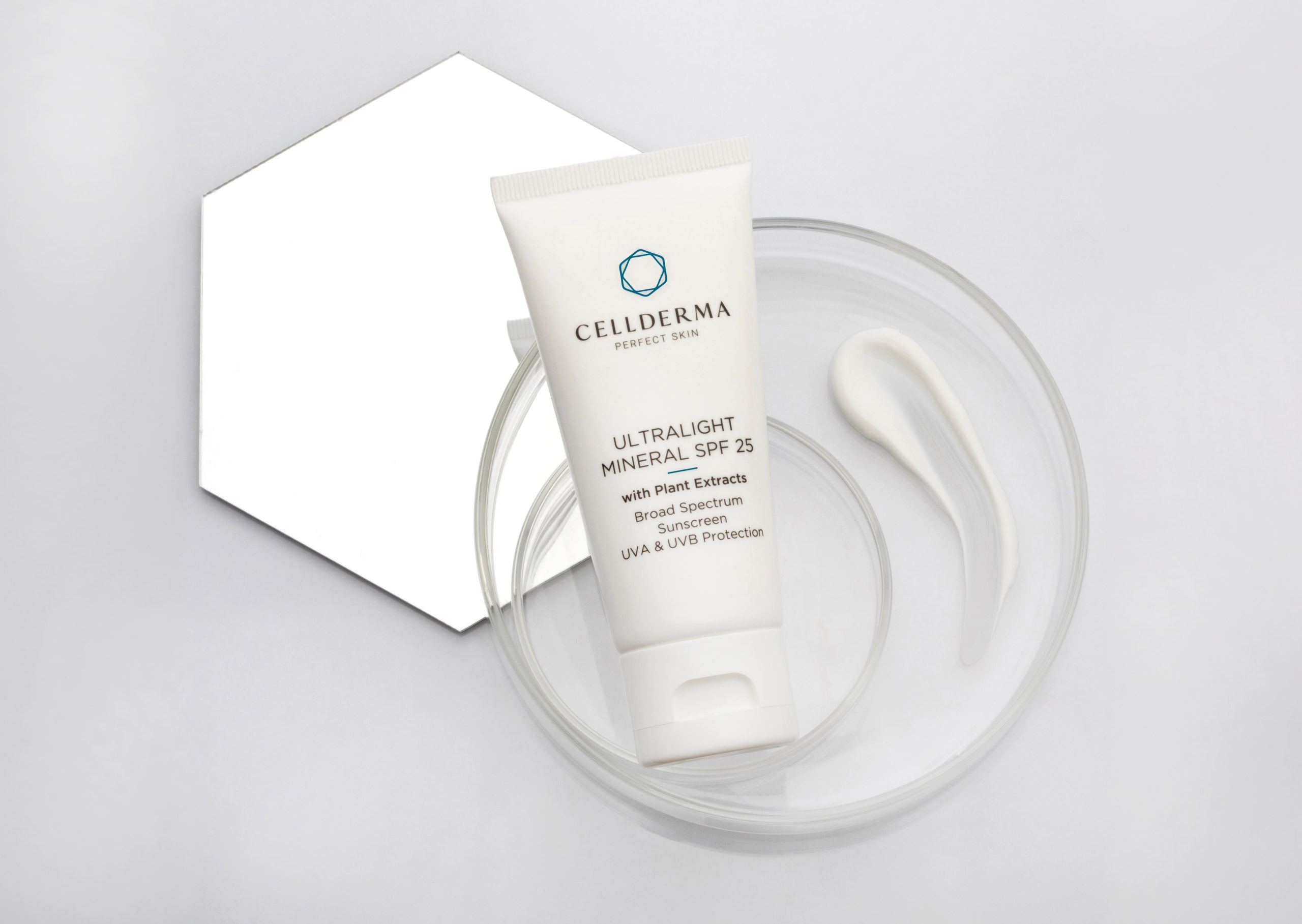 Ultralight Mineral SPF laying on mirror with slide professional photography