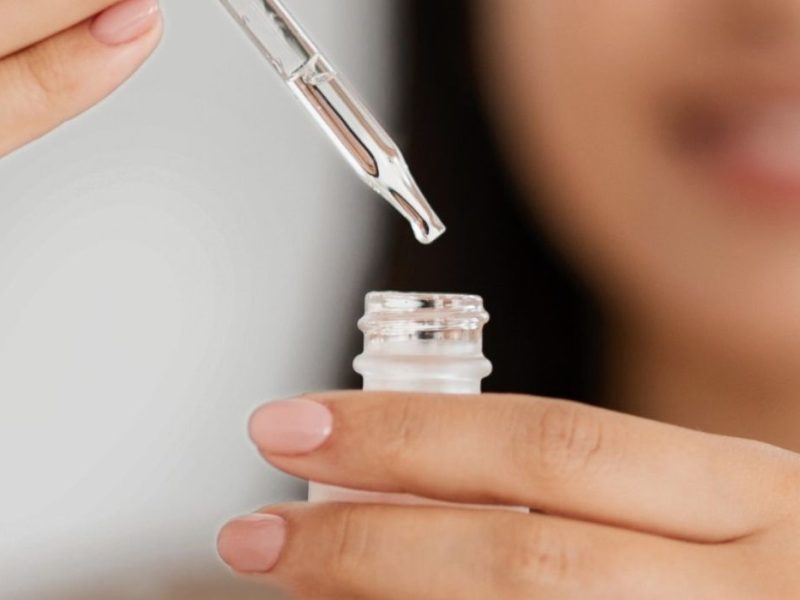 CellDerma Serum Bottle Pipette Woman Close Up Content Image